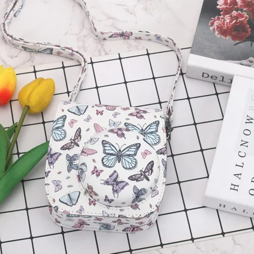 Vista 4 de Funda Protectora Compatible con Cámara de Fotos Instantáneas Fujifilm Instax Mini 12 11 9 8 con Bolsillo y Correa Ajustable (Mariposa Grande Pequeña)