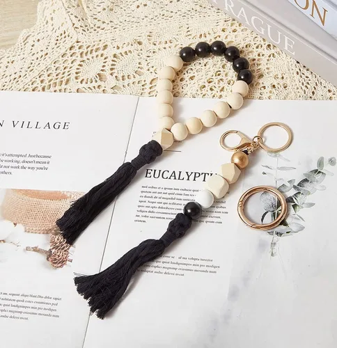 Vista 2 de Juego de llavero de pulsera hecho a mano con cuentas de madera con borlas para llaves, regalo de recuerdo