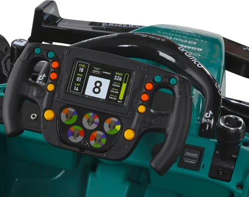 Vista 7 de Dynacraft Aston Martin Aramco Fórmula 1 Team Race Car de 12 V para edades de 3 a 8 años, con control remoto