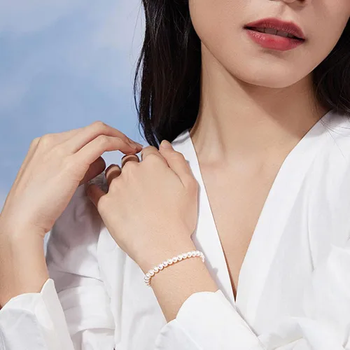 Vista 5 de Pulsera redonda de perlas blancas de 0.236 in para mujer, pulseras de perlas de concha simulada, accesorios de boda, regalo de joyería ajustable