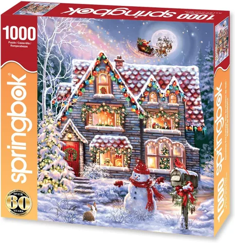 Vista 2 de El rompecabezas de 1000 piezas Navidad en la cabaña de la víspera de Navidad de Springbok es una imagen clásica de una acogedora cabaña navideña