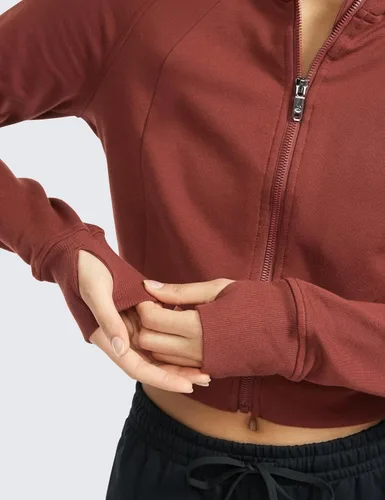Vista 5 de CRZ YOGA Sudadera corta con capucha y cremallera completa para mujer, para entrenamiento, atlética, casual, manga larga, con agujeros para el pulgar