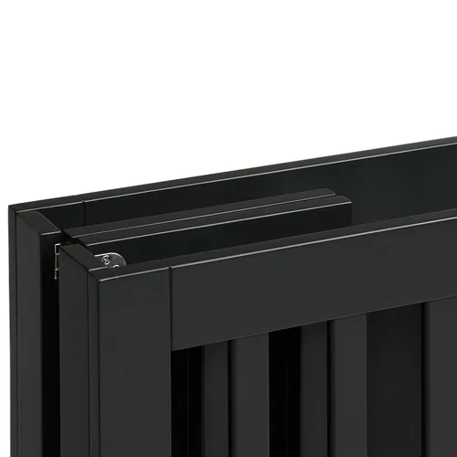 Vista 8 de Babyletto Origami Mini cuna plegable portátil con ruedas en negro, 2 posiciones de colchón ajustables, certificado Greenguard Gold