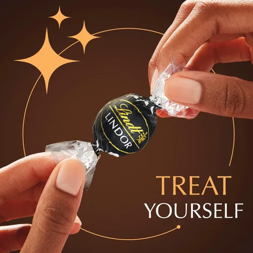 Vista 5 de Lindt Lindor - Trufas de chocolate extra oscuro 60 %, caramelo de chocolate negro con centro de trufa suave y derretida, ideal para regalar, 5.1