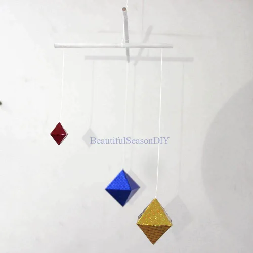 Vista 4 de Láser brillante octaédrico móvil bebé juguete brillante y brillante Montessori móvil con materiales respetuosos con el medio ambiente del bebé