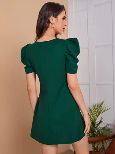 Vista 2 de WDIRARA Vestido casual de verano de manga corta abombada para mujer, cuello redondo, elegante, acampanado