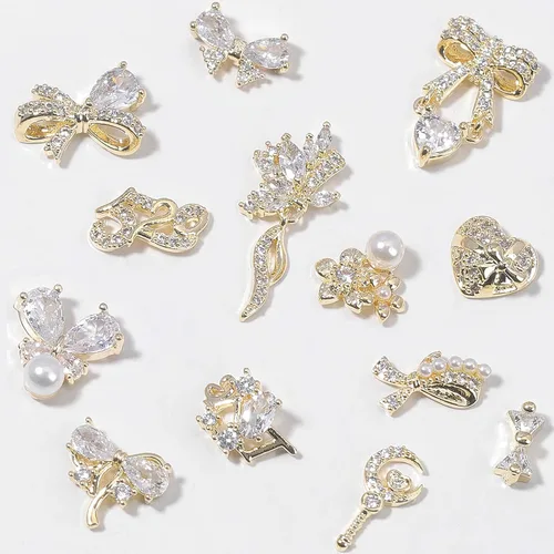 Vista 3 de Dijes y gemas para uñas, circonita de cobre dorado, múltiples formas 3D, diamantes de imitación de metal de lujo para uñas, 14 piezas 13 dijes