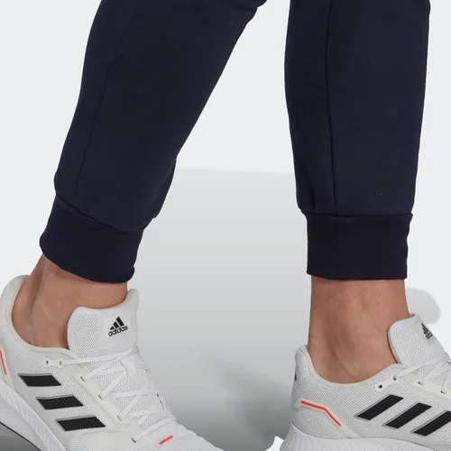 Vista 4 de adidas Pantalones cónicos regulares de forro polar Essentials para hombre