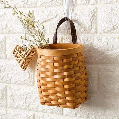 Vista 6 de Cesta colgante de mimbre tejida a mano, cesta de almacenamiento de madera portátil para colgar en la pared, cesta de flores, organizador de frutas