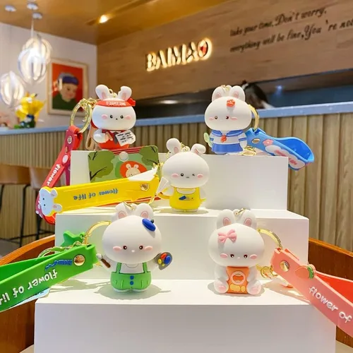 Vista 6 de BEXOA Lindo llavero de regalo de Navidad Llavero de conejo Kawaii de Año Nuevo para niños y niñas, mochila con dijes para mujeres y hombres