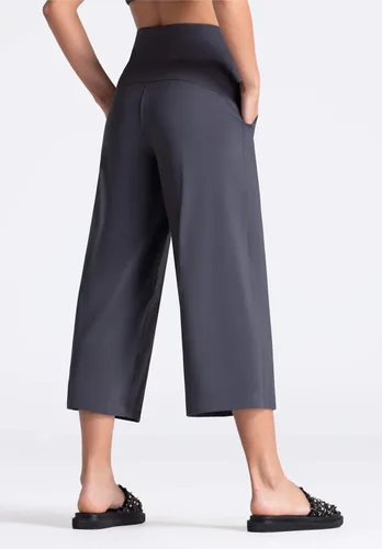Vista 6 de THE GYM PEOPLE - Pantalones capris de yoga para mujer, con corte bota, bolsillos, cintura alta para control de abdomen, para entrenamiento