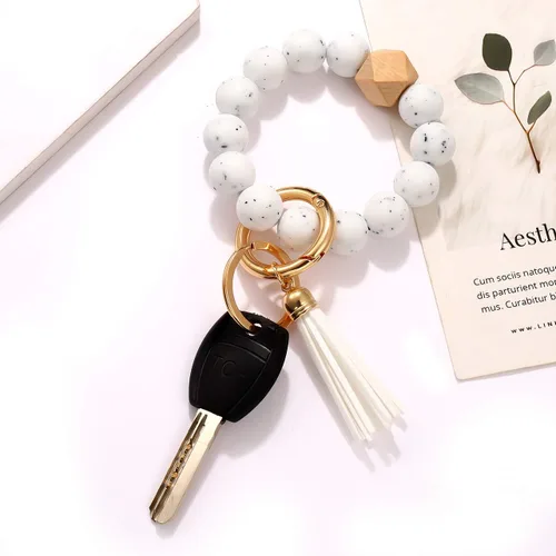 Vista 4 de Llavero de silicona, pulsera con cuentas, portátil, para llaves de la casa, del auto, con anillo