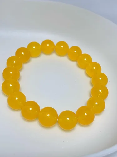 Vista 4 de Pulsera de cornalina de jade de 0.394in con cuentas de piedra de nacimiento de cuentas de equilibrio elástico hecho a mano (amarillo y rojo)