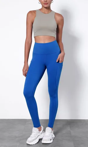 Vista 3 de ODODOS - Leggings capri de cintura alta, con bolsillos, control de abdomen, para mujer, no se transparentan, para yoga, entrenamiento, deportes