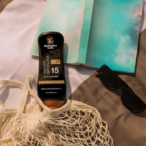 Vista 5 de Australian Gold Loción de protección solar con bronceador instantáneo SPF 15, 8 onzas, amplio espectro, resistente al agua, no graso, SPF 15, 8