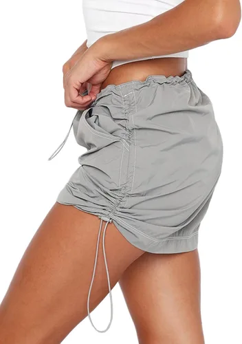Vista 3 de OPOIPIN Minifalda corta de verano con cordón de cintura baja para mujer, con bolsillos