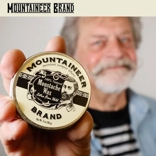 Vista 2 de Cera de bigote de marca Mountaineer, natural, sin residuos, clara y fácil de usar, 2 oz de estaño, Original