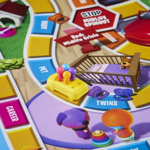 Vista 11 de Juego de mesa The Game of Life, juegos familiares para niños de 8 años en adelante, las clavijas vienen en 6 colores, juegos de mesa familiares