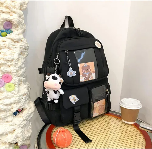 Vista 2 de Linda mochila con bonito oso de peluche accesorios de gran capacidad bolsas escolares estéticas para niñas y adolescentes Negro 1 talla única Lindo