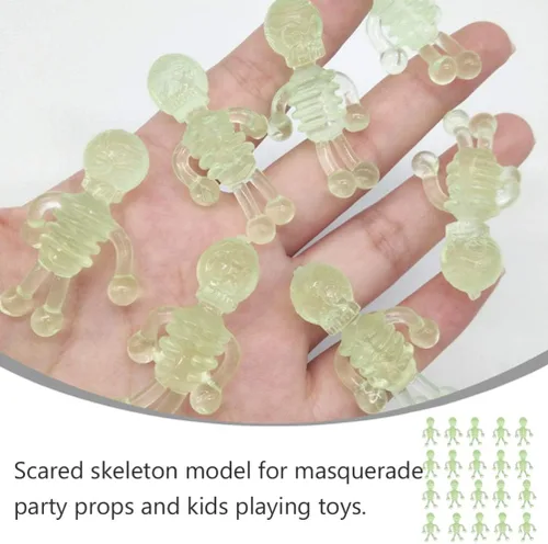Vista 5 de TOYANDONA 20 piezas de juguetes elásticos de Halloween, Halloween que brilla en la oscuridad, juguete de esqueleto luminoso para niños