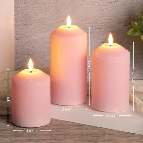 Vista 2 de Juego de 3 velas de pilar sin llama color rosa con control remoto, velas LED de cera real que funcionan