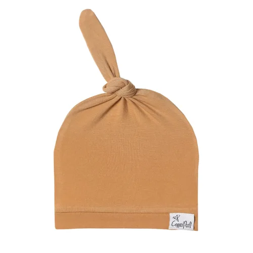 Vista 34 de Copper Pearl Gorro de bebé con nudo superior elástico suave Lennon