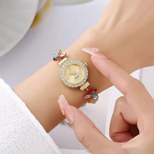 Vista 2 de ADSBIAOYE Reloj de pulsera floral simple de moda para mujer, reloj de lujo ligero de cuarzo con diamantes Dorado