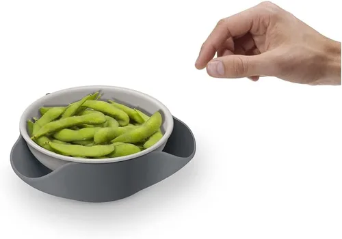 Vista 6 de Joseph Joseph Cuenco doble para servir pistacho y aperitivos con compartimento para desechos de alimentos, sin BPA, color gris