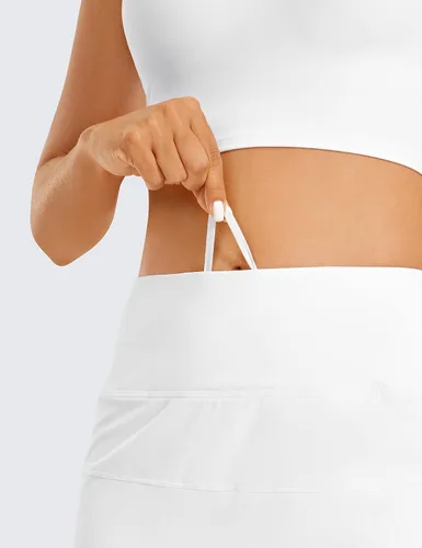 Vista 5 de CRZ YOGA Faldas de tenis ligeras de cintura alta para mujer, línea A, para entrenamiento, correr, deportes, golf, con bolsillos