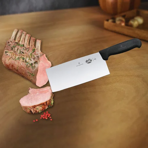Vista 5 de Victorinox Cuchillo de chef clásico chino de 7" Cuchillo de carnicero de acero inoxidable Mango Fibrox Hecho en Suiza