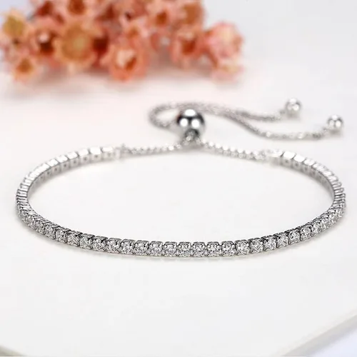 Vista 2 de Delicada pulsera de tenis de moissanita de oro de 18 quilates con diamantes completos de una sola fila y deslizador ajustable, regalo del día