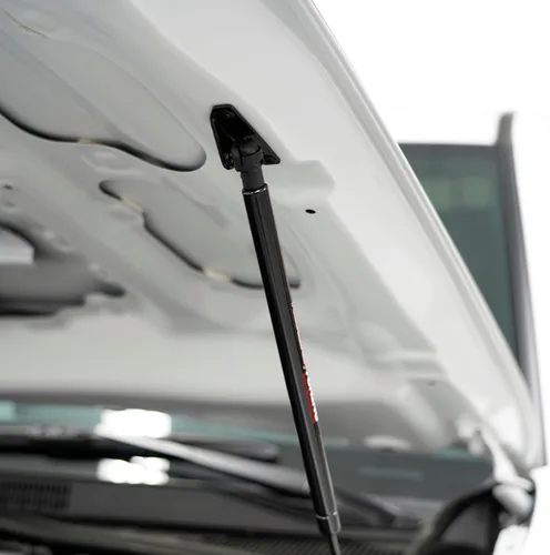 Vista 3 de Redline Tuning 21-27015-02 sistema de cofre de elevación rápida para Toyota Tacoma - Con revestimiento negro y revestimiento antipolvo negro Hood