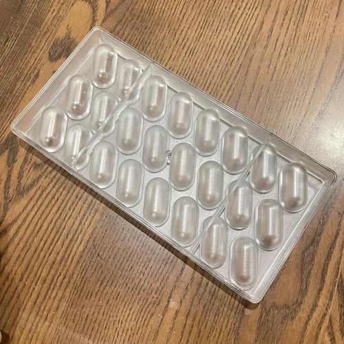 Vista 6 de 24 tazas de 1.6 pulgadas forma de cápsula grande ovalada molde de chocolate de policarbonato bonbon chocolate DIY molde de trufa dulce bandeja