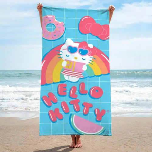 Vista 3 de Jay Franco Hello Kitty Rainbow - Toalla de playa para piscina y baño, súper suave y absorbente, 100% algodón, mide 28 x 58 pulgadas Azul - Hello