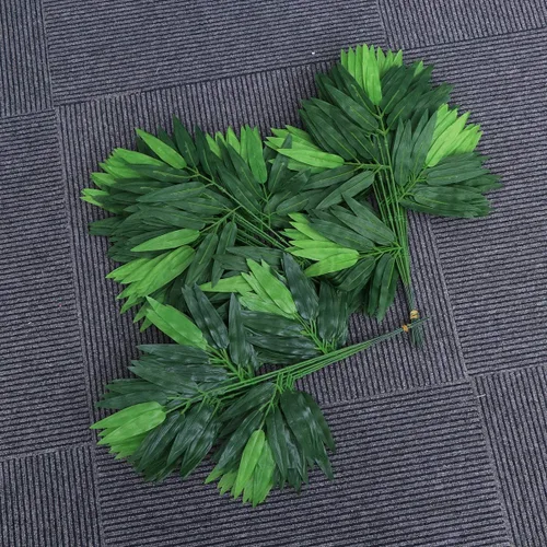 Vista 5 de Hojas artificiales de bambú, 50 hojas de vegetación falsas de 17.71 x 9.44 pulgadas, paneles de hojas de bambú simuladas para decoración del hogar