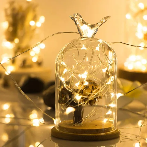 Vista 2 de ANJAYLIA Paquete de 4 luces de hadas de 16.4 pies, 50 luces LED, funciona con pilas, mini luces estrelladas parpadeantes para bodas, fiestas Blanco
