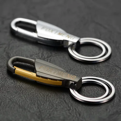 Vista 5 de Llavero para hombre, elegante llavero para hombres y mujeres, 2 piezas (pistola negra y plateada)