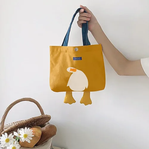Vista 3 de Bonita bolsa de lona para mujer, bolsa de tela de algodón reutilizable para el almuerzo, compras y playa (pato amarillo de transporte a mano)