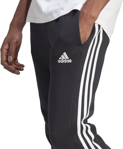 Vista 4 de adidas Pantalones Essentials de forro polar con 3 rayas para hombre, Negro