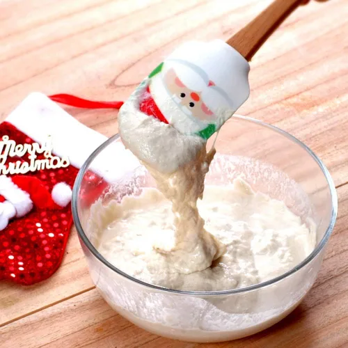 Vista 4 de Espátula de silicona de Navidad, juego de 2, espátula grande de Papá Noel y muñeco de nieve con mango de madera, ideal para decoración de Navidad