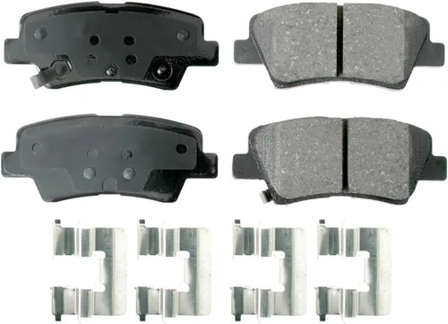 Vista 3 de Rotores de disco sólidos con revestimiento ranurado perforado de 10.315 in y pastillas de cerámica Akebono ProACT Sensores acústicos Kit de freno