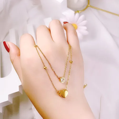 Vista 7 de Paquete de 2 collares con dije de corazón de circonita cúbica de titanio para mujeres, adolescentes y niñas, de acero inoxidable, cadena de capa