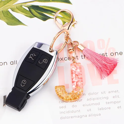 Vista 3 de Suweibuke Lindos llaveros rosados para mujeres y niñas, llaveros de letra inicial con borla, dijes para llaves, bolsos, mochilas