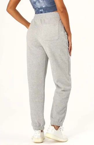 Vista 2 de icyzone Pantalones deportivos de forro polar para mujer, pantalones deportivos con bolsillos, pantalones gruesos para descansar