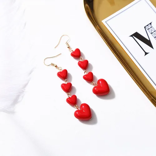 Vista 5 de Pendientes de borla de corazón rojo con cuentas de melocotón y borla larga para mujeres y niñas
