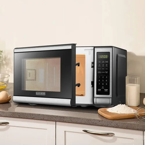 Vista 6 de BLACK+DECKER EM720CB7 Horno microondas digital con puerta giratoria con botón, bloqueo de seguridad para niños, 700 W, acero inoxidable, 0.7 pies