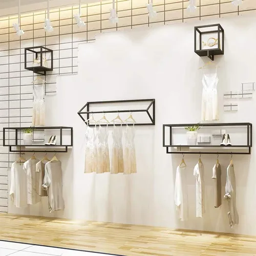 Vista 9 de Percheros creativos triangulares para ropa en tiendas de ropa, estante colgante de pared para el hogar, toalleros para almacenamiento en el baño
