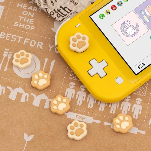 Vista 5 de GeekShare Cat Paw Shape Thumb Grip Caps,Soft Silicone Joystick Cover Compatible with Nintendo Switch OLED Switch Lite (Brown & Yellow)