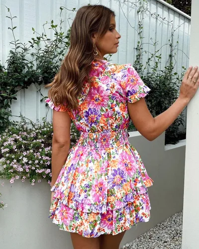 Vista 3 de PRETTYGARDEN - Mini vestido de verano con vuelo para mujer. Vestido corto acampanado con cuello en V y manga corta con volantes en la parte delantera