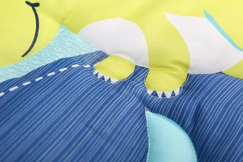 Vista 6 de Juego de ropa de cama de cuna de dinosaurio azul T-Rex con temática de dinosaurio para bebé, juego de ropa de cama + sábana bajera + falda + cenefa